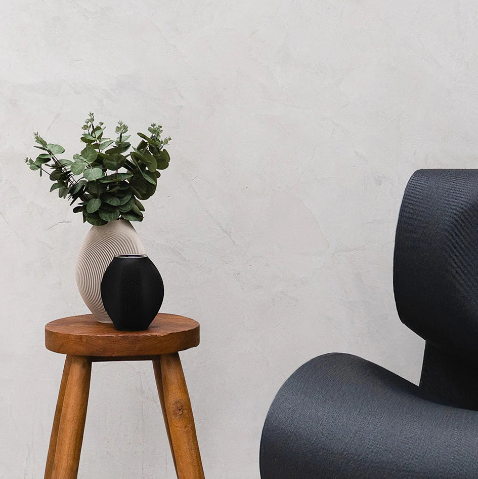 Bay Vases on Side Table with Armchair