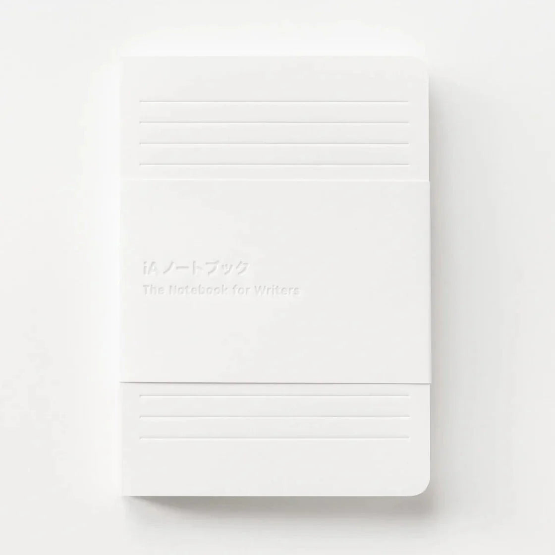 White notebook with horizontal lines on a white background