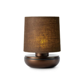 Brown textured table lamp on a white background
