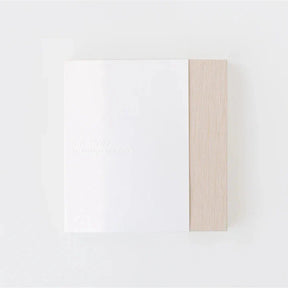 Wooden frame on a white wall