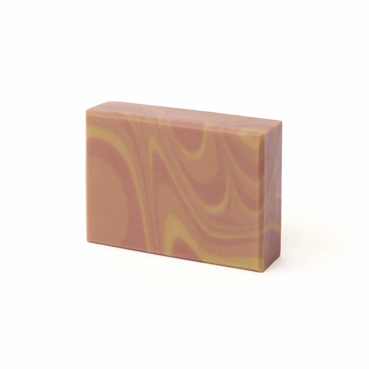 Marbled pink and yellow soap bar on a white background